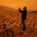 En fotos: Los cielos de Atenas se vuelven anaranjados por la tormenta de polvo del Sahara