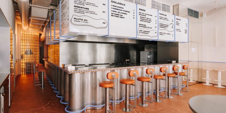 Los tonos de caramelo y las líneas ondulantes forman el interior de fusión de la barra de hamburguesas de plutón