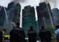 Al menos 94 muertos en incendio en Hong Kong mientras las autoridades continúan buscando a cientos de desaparecidos