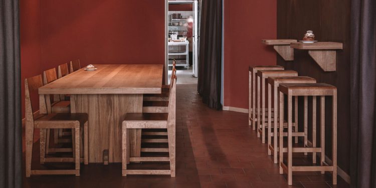 Common integra una micropanadería y una pizzería en un interior flexible en Berlín