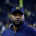 Sherrone Moore, ex entrenador de fútbol de Michigan, acusado de allanamiento de morada: NPR